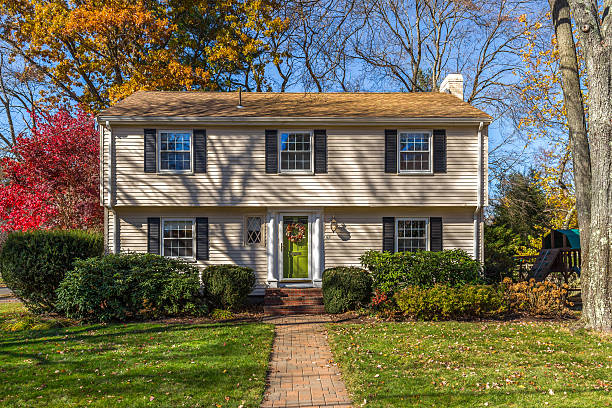 A well-kept suburban home with autumn landscaping